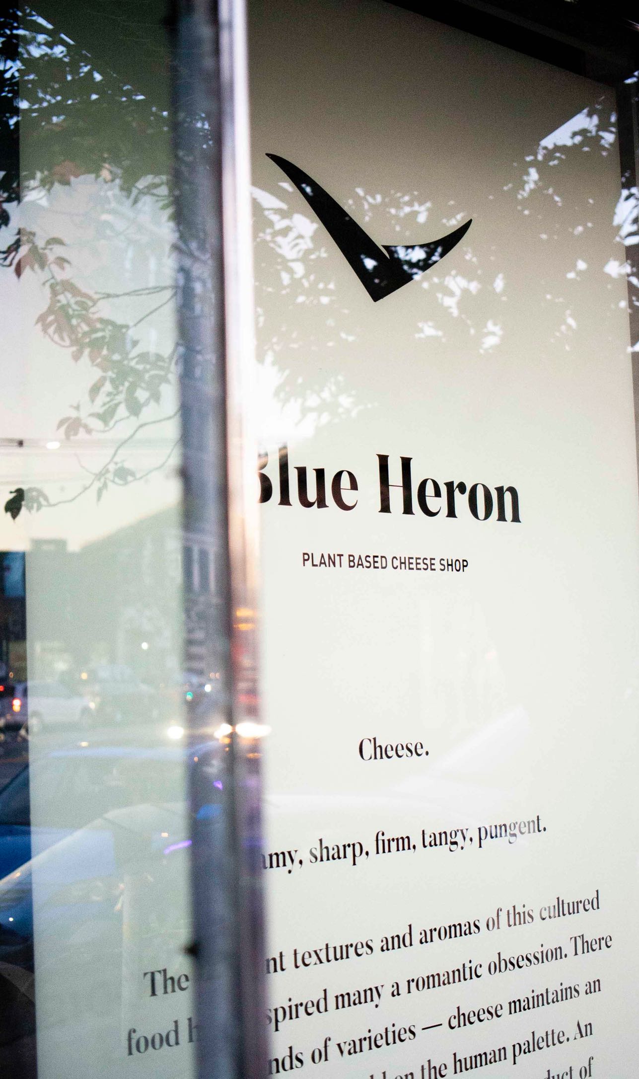 Blue Heron Cheese store window with handpainted logo and brand manifesto — by Dima Yagnyuk.