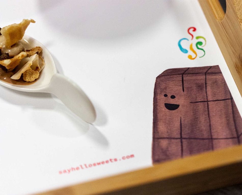 Say Hello bite sized ice cream sunday scoop presentation with chocolate nirvana illustration — by Dima.