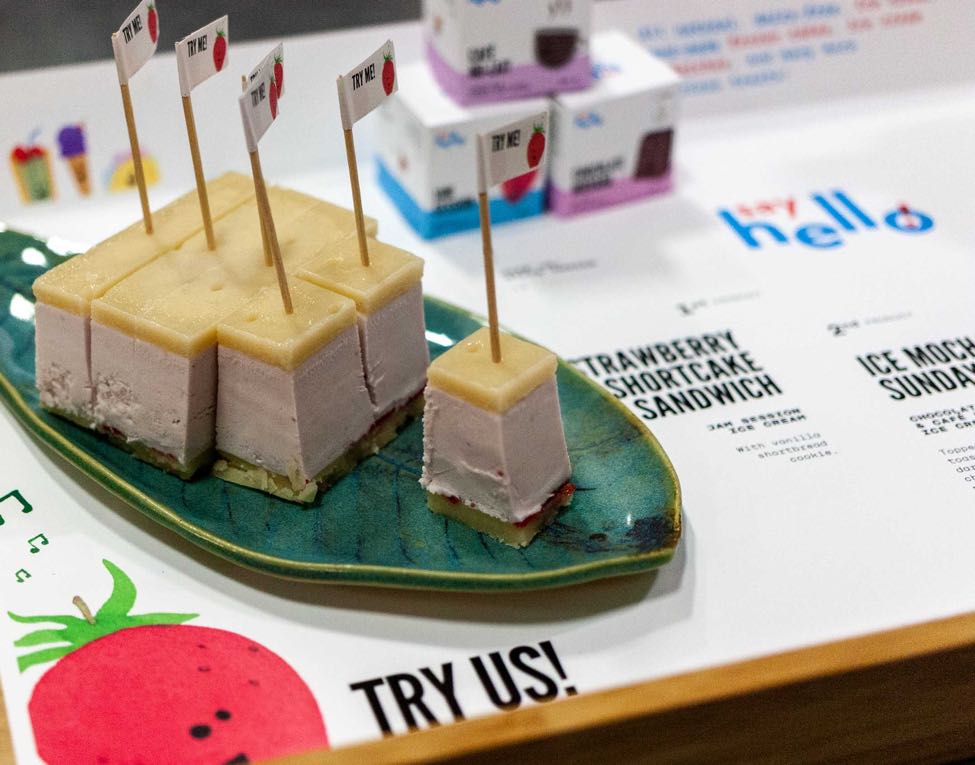 Say Hello Sweets close up of sliced strawberry ice cream sandwich on a turquoise plate for BC Product of the Year — by Dima.
