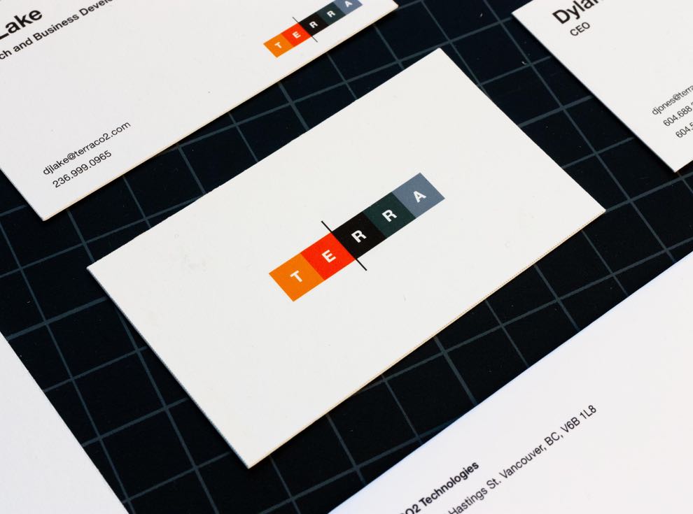 Vibran Orange and Black Terra CO2 logo the back of the business card — by Yagnyuk.