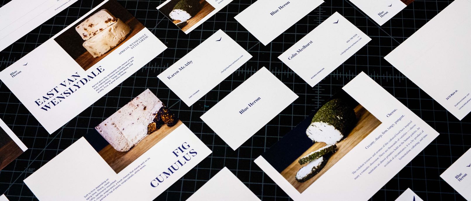 Series of cheese focused postcards and business cards for Blue Heron Cheese, each featuring a macro photo of the cheese and Karen McAthy's product descriptions — by Dima Yagnyuk.