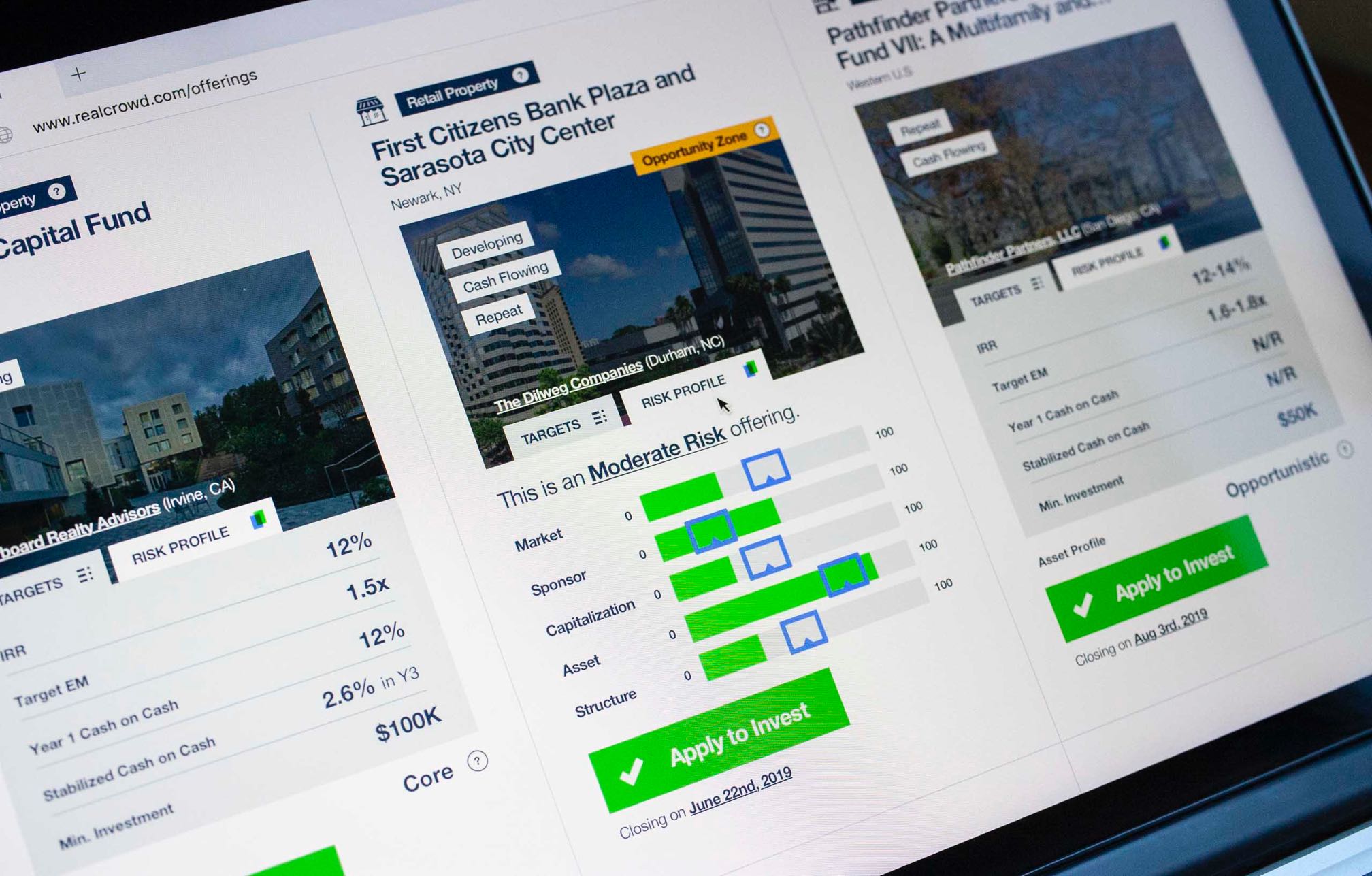 Close up of RealCrowd real estate property card offerings in 2 variations, showing property targets and customer risk profile — by Dima Yagnyuk.