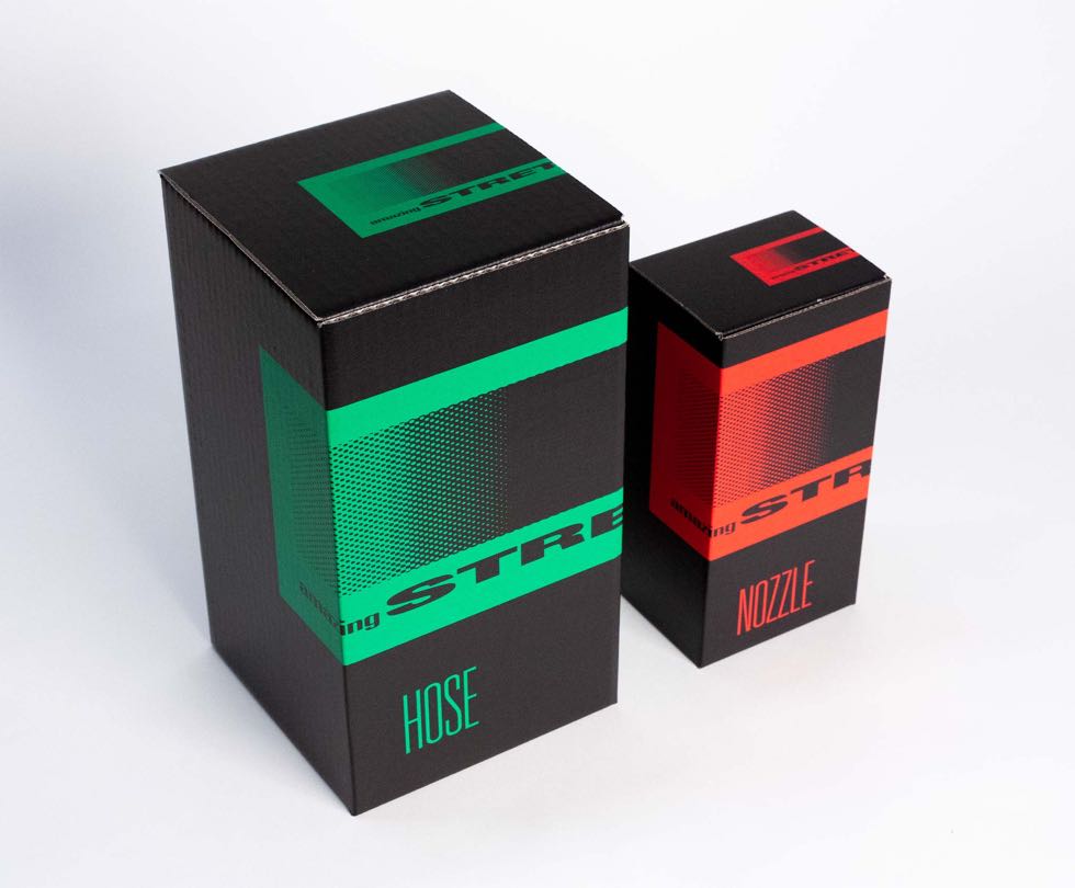 Black packaging with vibrant green and red Amazing Stretch Hose and Nozzle branding — by Dima Yagnyuk.