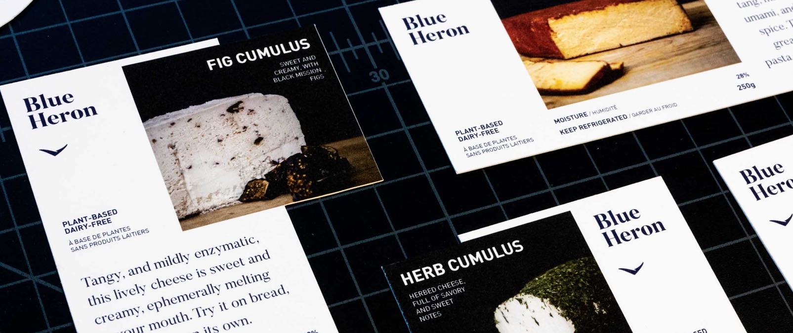 Blue Heron Cheese Labels, featuring prominent photography of Fig and Herb Cumulus featuring flavour descriptions by chef Karen McAthy — by Yagnyuk.