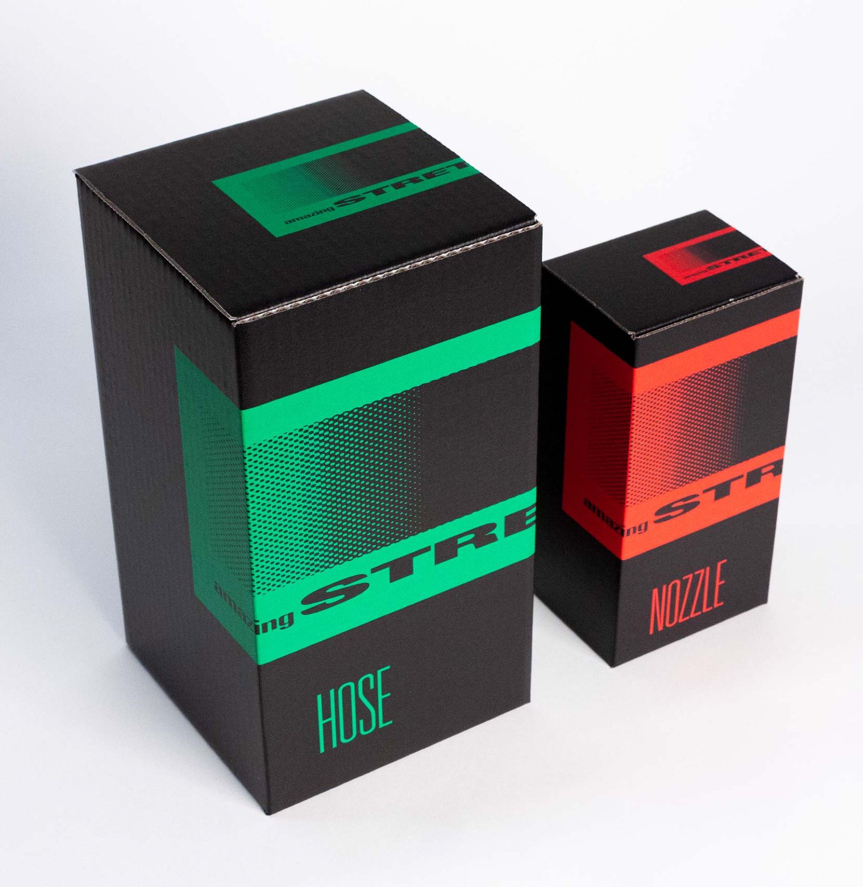 Amazing Stretch neon green Garden Hose and neon red Nozzle reinforced corrugated packaging for display and shipping — Dima Yagnyuk.