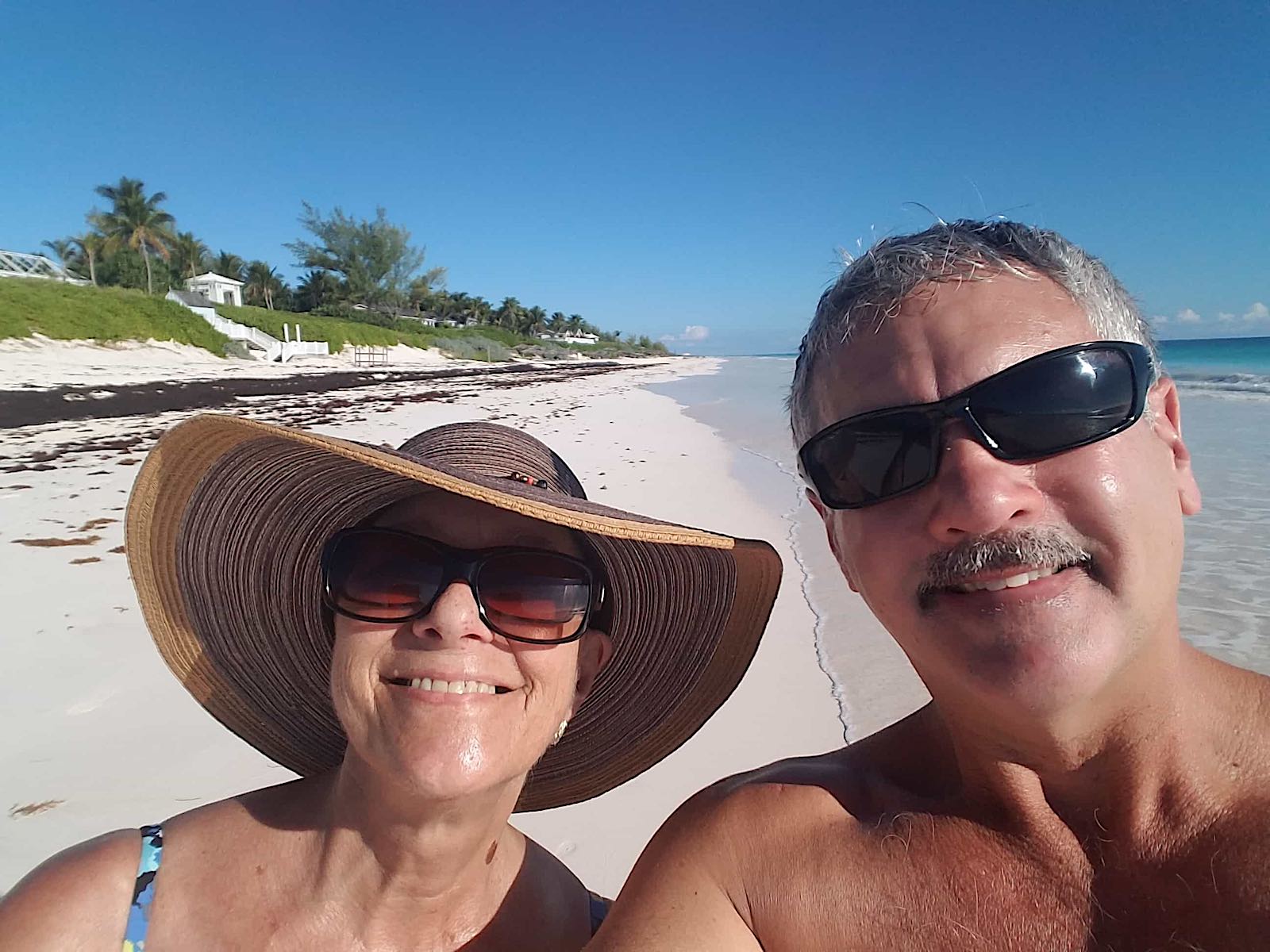 gail taking a selfie with man on the beach