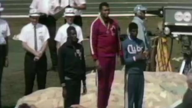 Harry Jerome receives his gold medal at the 1967 Pan Am Games