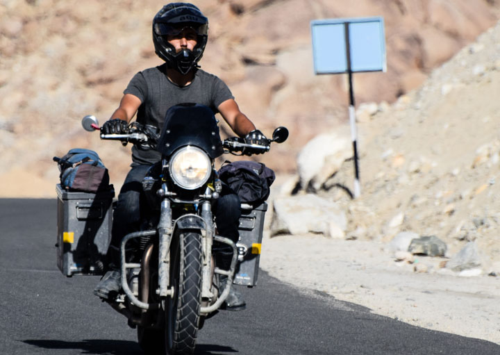Kane on the road on his Bonneville