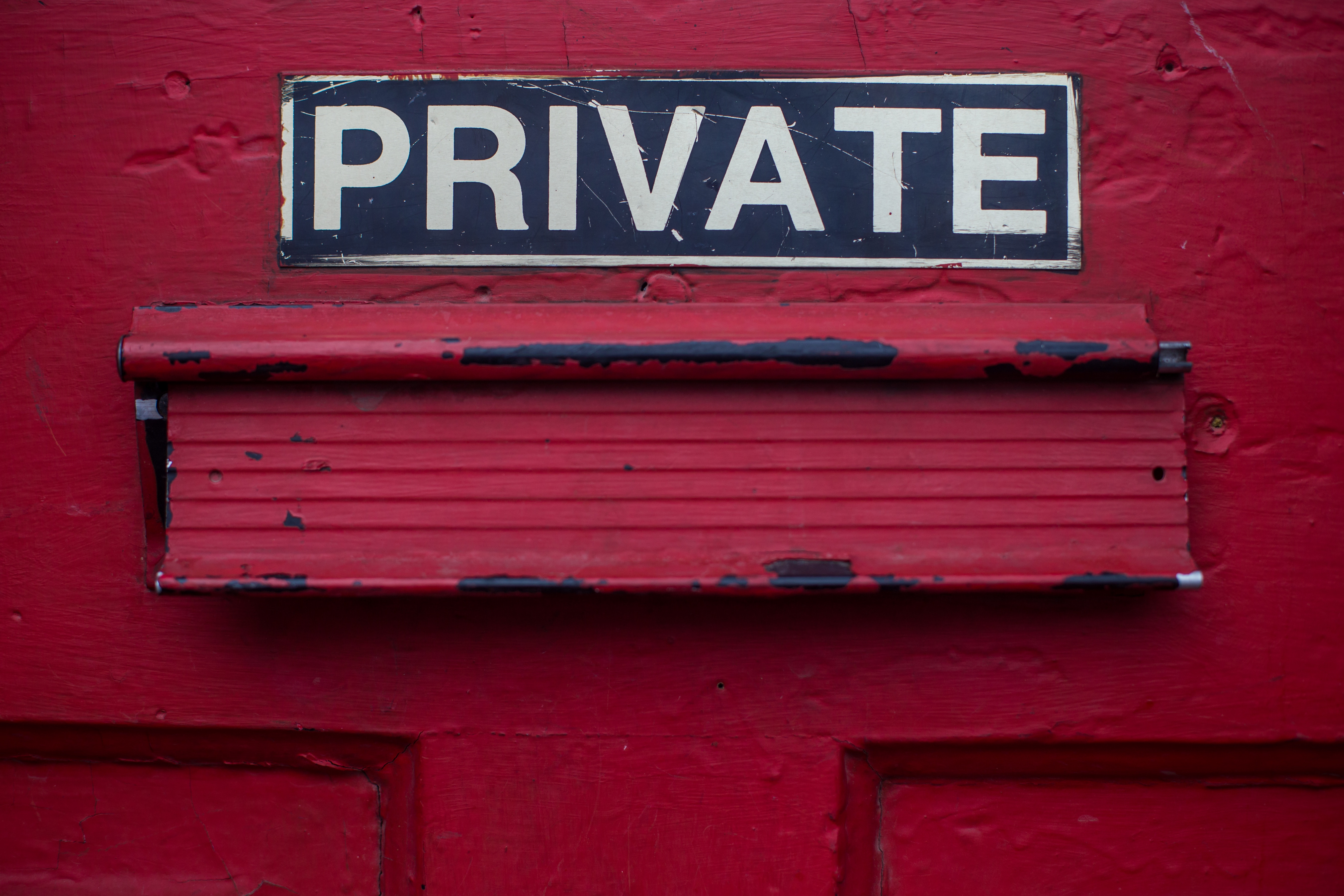 PRIVATE on red door