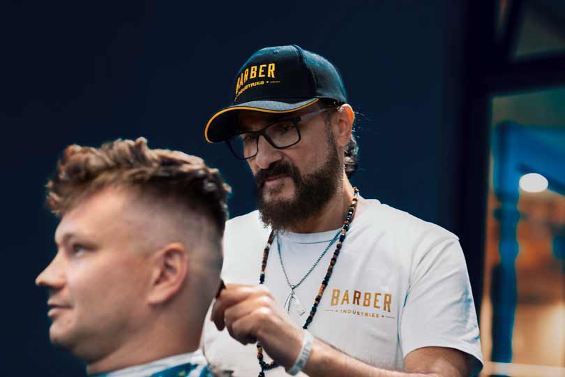 Barber Fadi Hamadeh cutting hair
