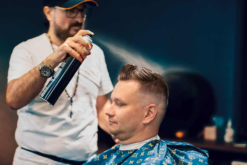 Barber styling hair