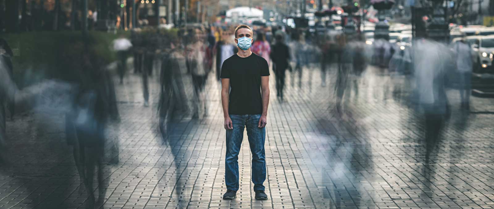 Man in Sydney street wearing mask - Coronavirus Lockdowns