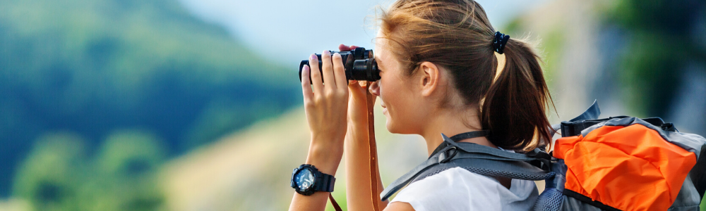Girl on binoculars