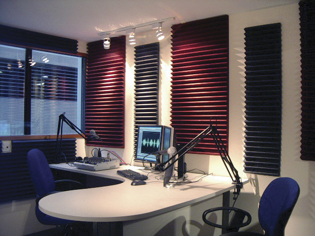 A recording studio with Auralex foam panelling.
