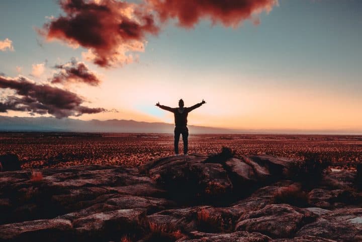 Digital Nomad Jobs - Man's Celebratory Silhouette