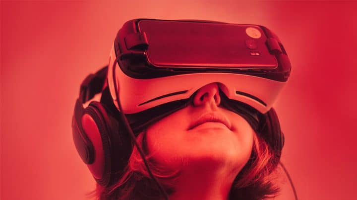 a boy wearing a vr machine