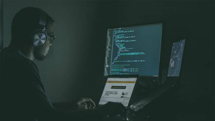 a man coding at night