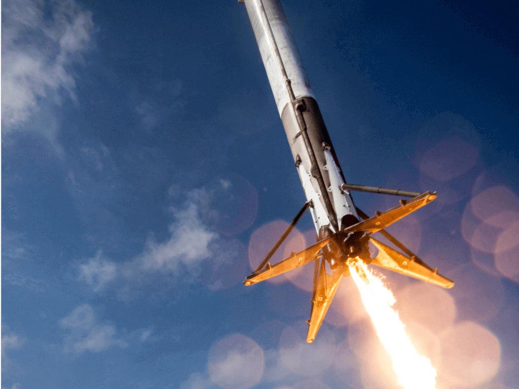 A rocket taking off to space