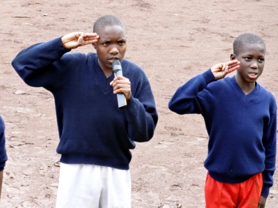 The first items on the event program were team instructions, prayer, raising of the flag, and singing of the National Anthem led by the Kwa Watoto Scouts.