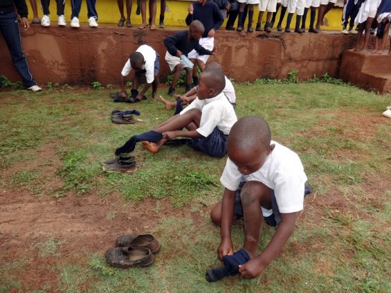 The Preschool class participated in their own sporting events focused on speed, motor skill dexterity, balance, concentration, and following instructions. One of the races involved dressing in the full school uniform as fast as possible, and being neatly attired at the end of the race, with shirts buttoned correctly.