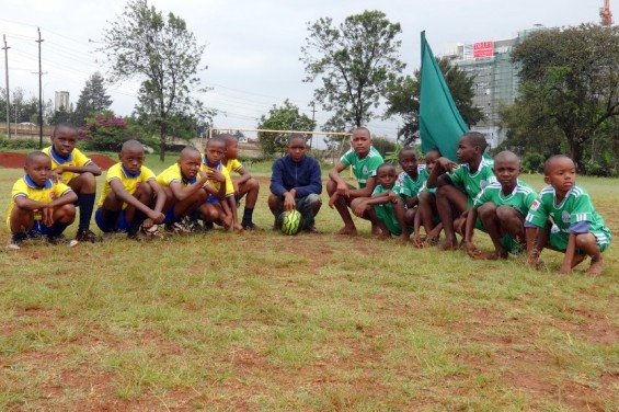 The sporting events kicked off with football. Red and Blue teams competed together as one football team and Green and Yellow made up the other team. 