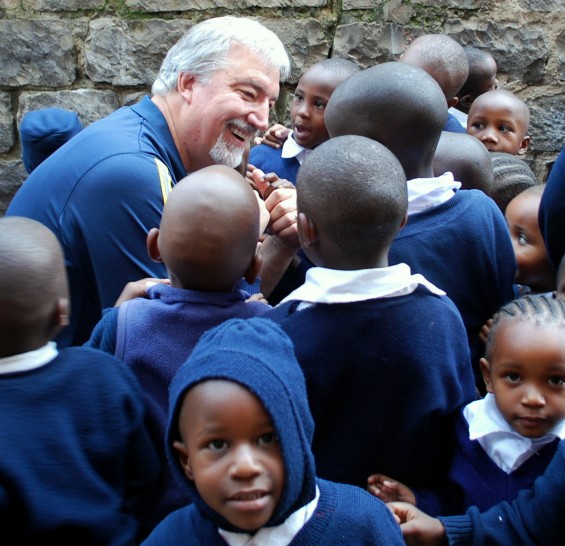 Tom Friedel interacting with preschool students at recess