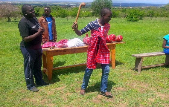 The boys were presented with a Maasai Blanket and a rungu, a short staff, a symbol of authority. These two items symbolize a leader and a protector.