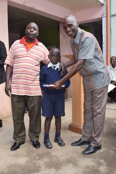 Parent's Chairman, Baba Eugene, with his son and Bishop Isaiah