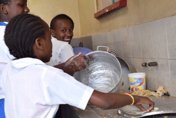 Washing dishes at Missions of Charity Home