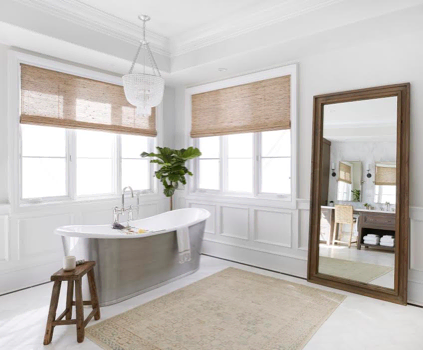 A bathroom with a custom window treatment | Everhem