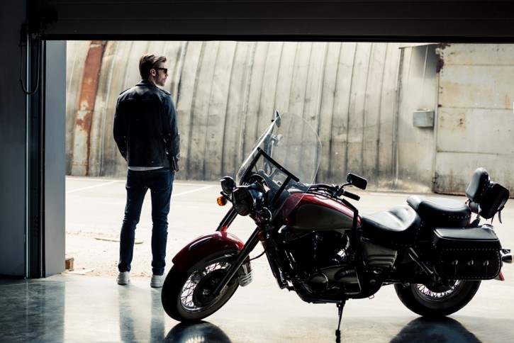 guy chilling next to his bike