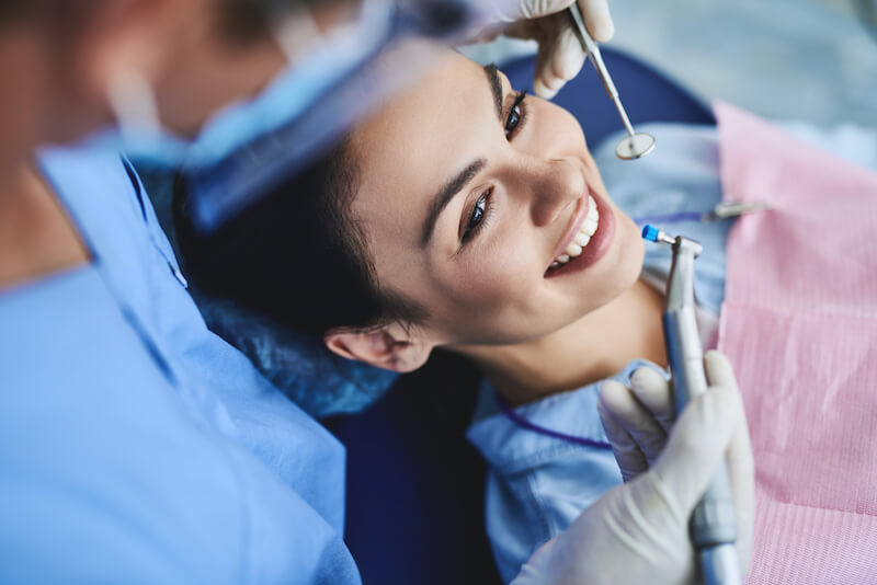 patient smiling at dentist