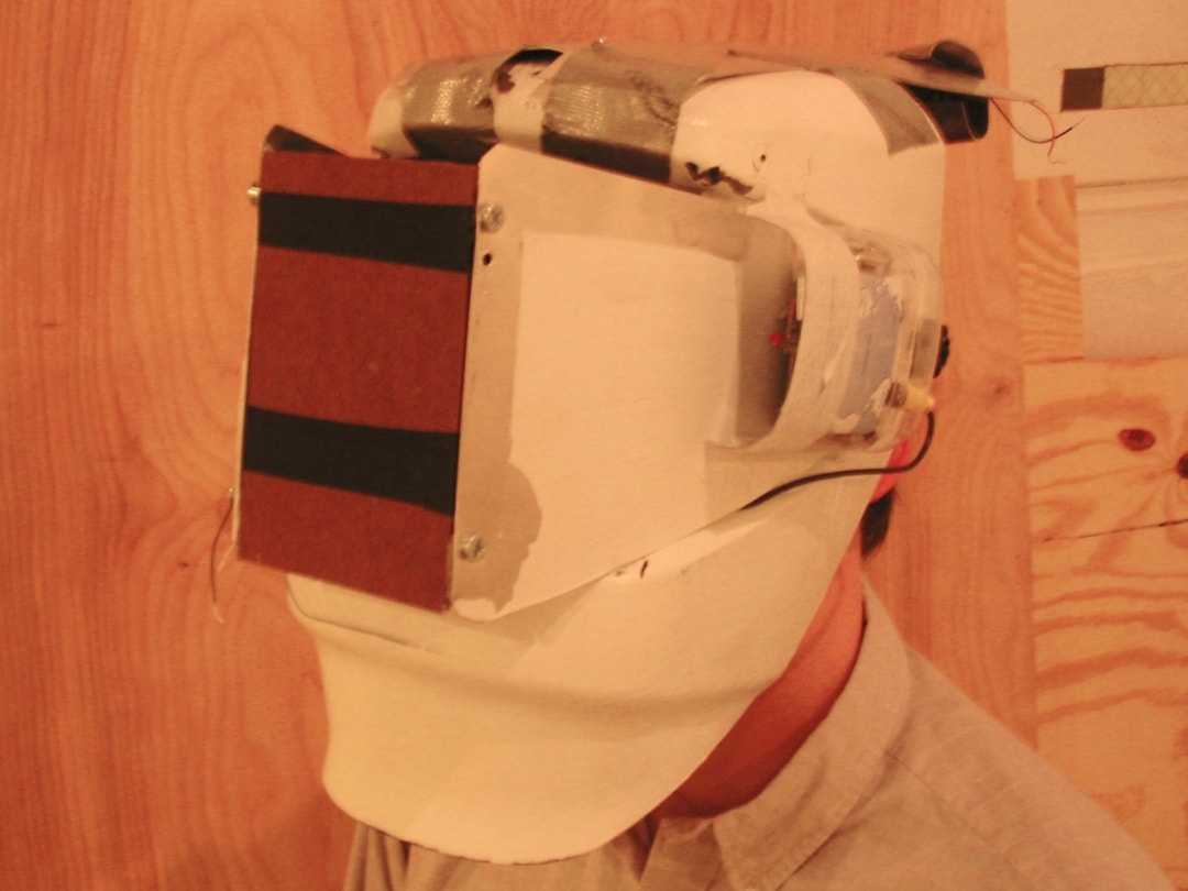 An image of a person with a prototype augmented reality helmet.