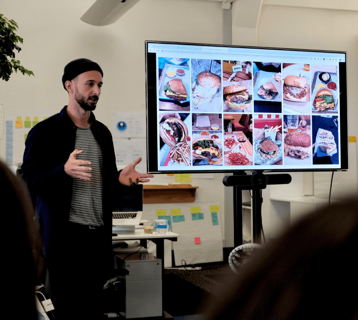 A Digital Arts Network employee presenting his Pecha Kucha