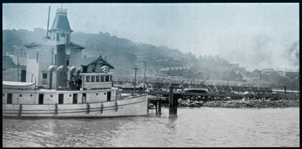 An old photo of a passenger ship at dock on Angel Island