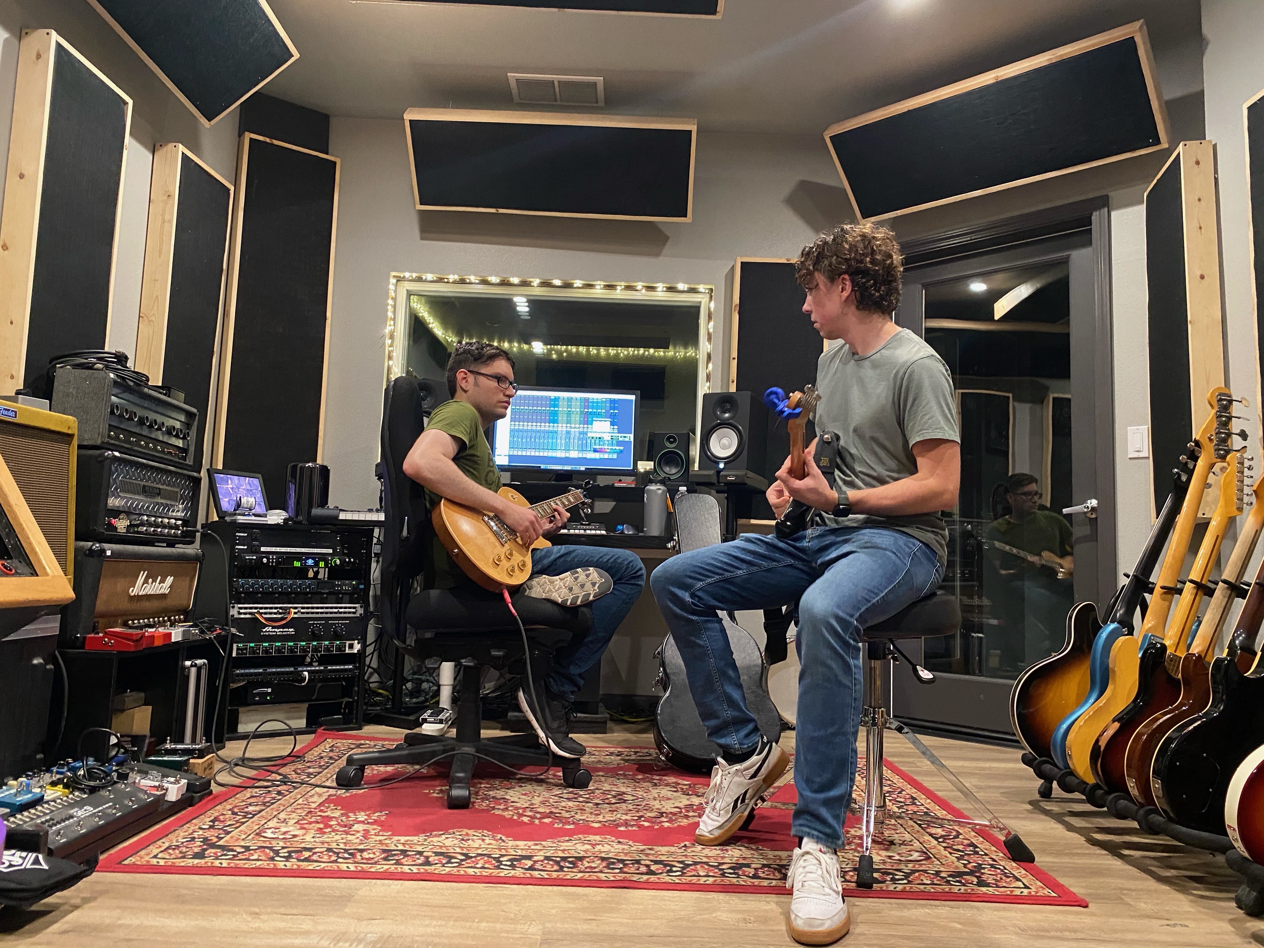 Charles and Noah recording guitar on Head in the Sand