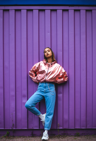 a woman in a pink jacket.