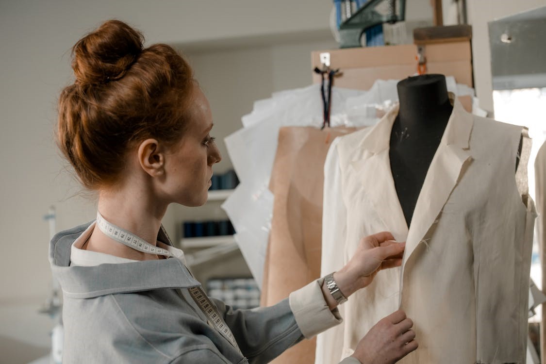Fashion designer busy in garment sample making