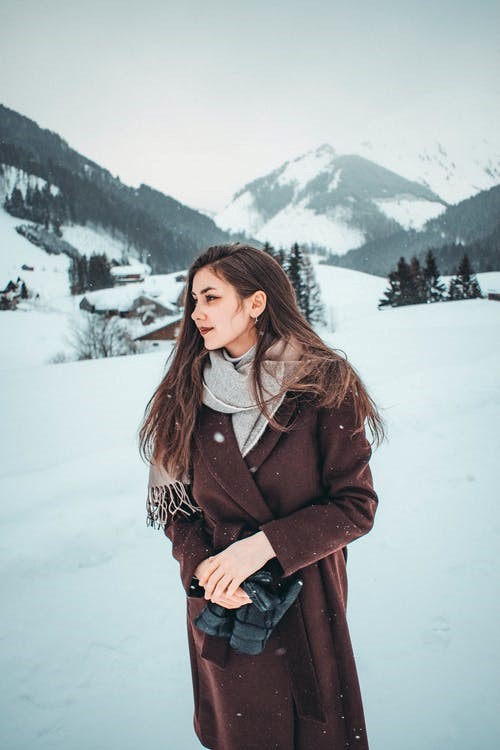 a woman wearing a winter coat