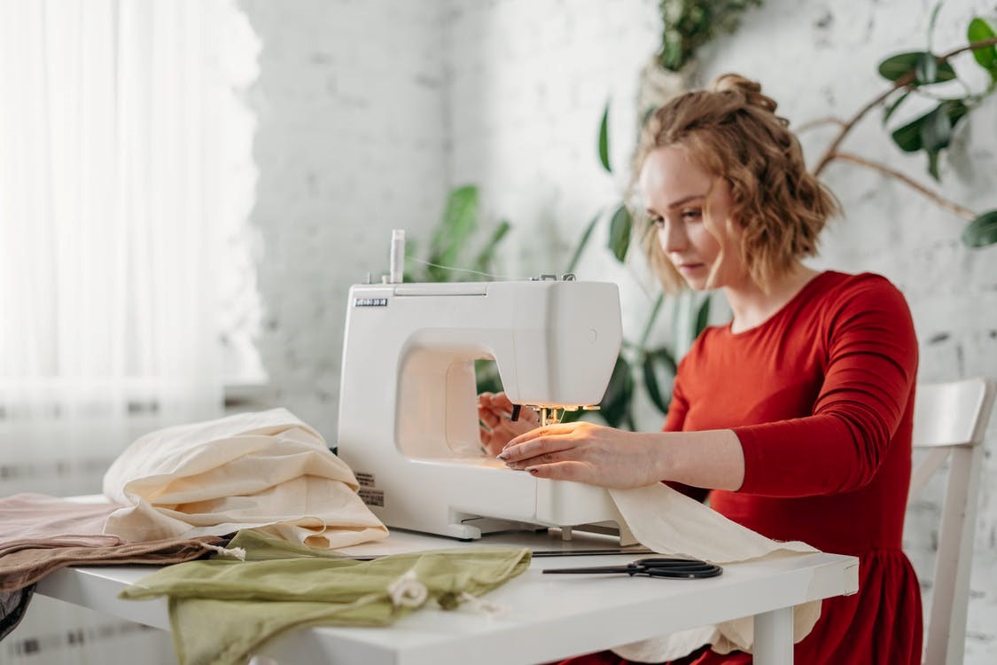 a cloth manufacturer sewing clothes