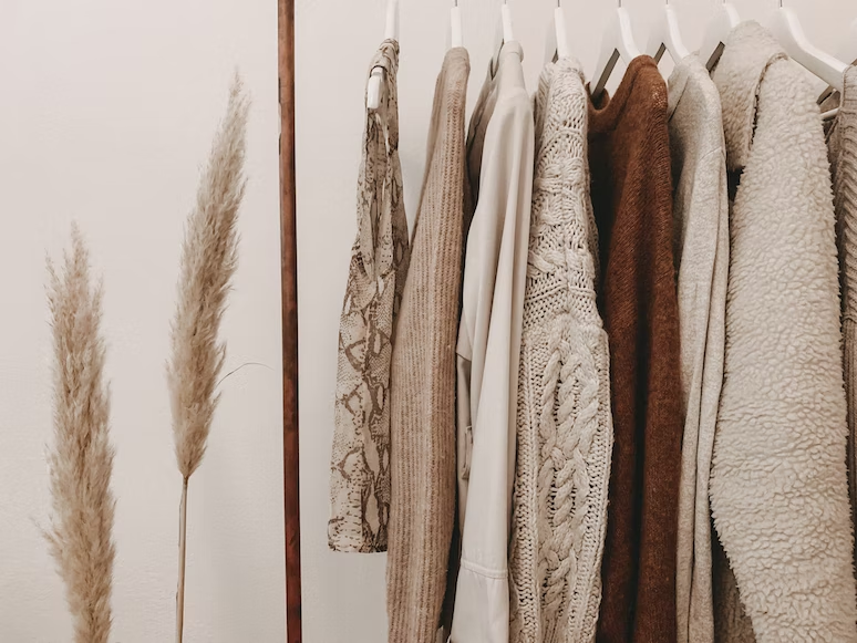 Hanging winter clothes from a sustainable fashion brand