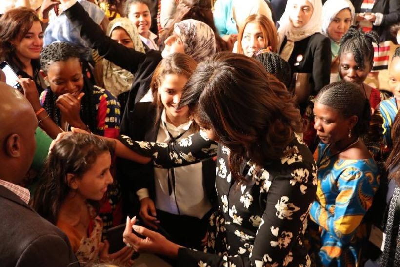 At the White House, after the debut of the CNN movie "We Will Rise", the First Lady hugs the stars whose stories were featur