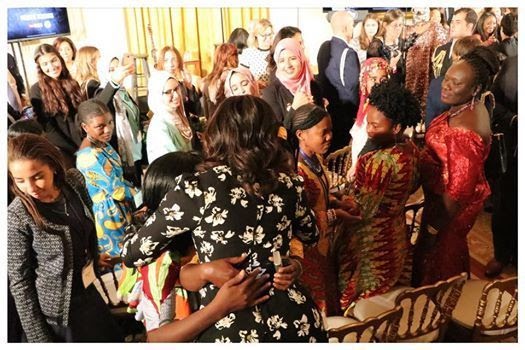 At the White House- Michelle Obama hugging the stars after the screening