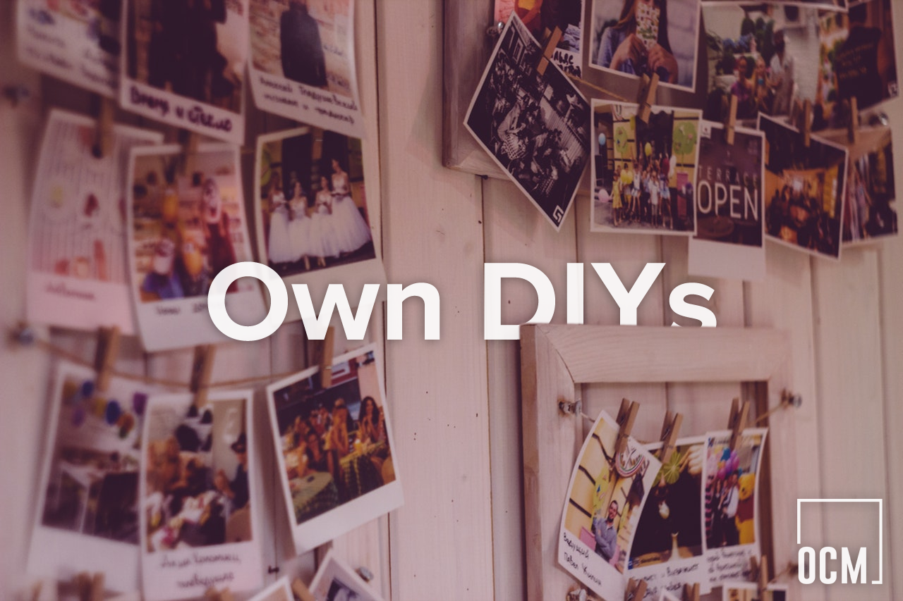 wall with instant photos clipped to it