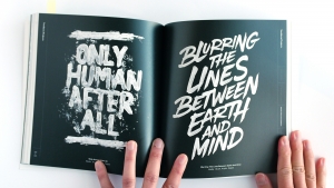 Black and white hand-lettering artwork with geometric patterns.