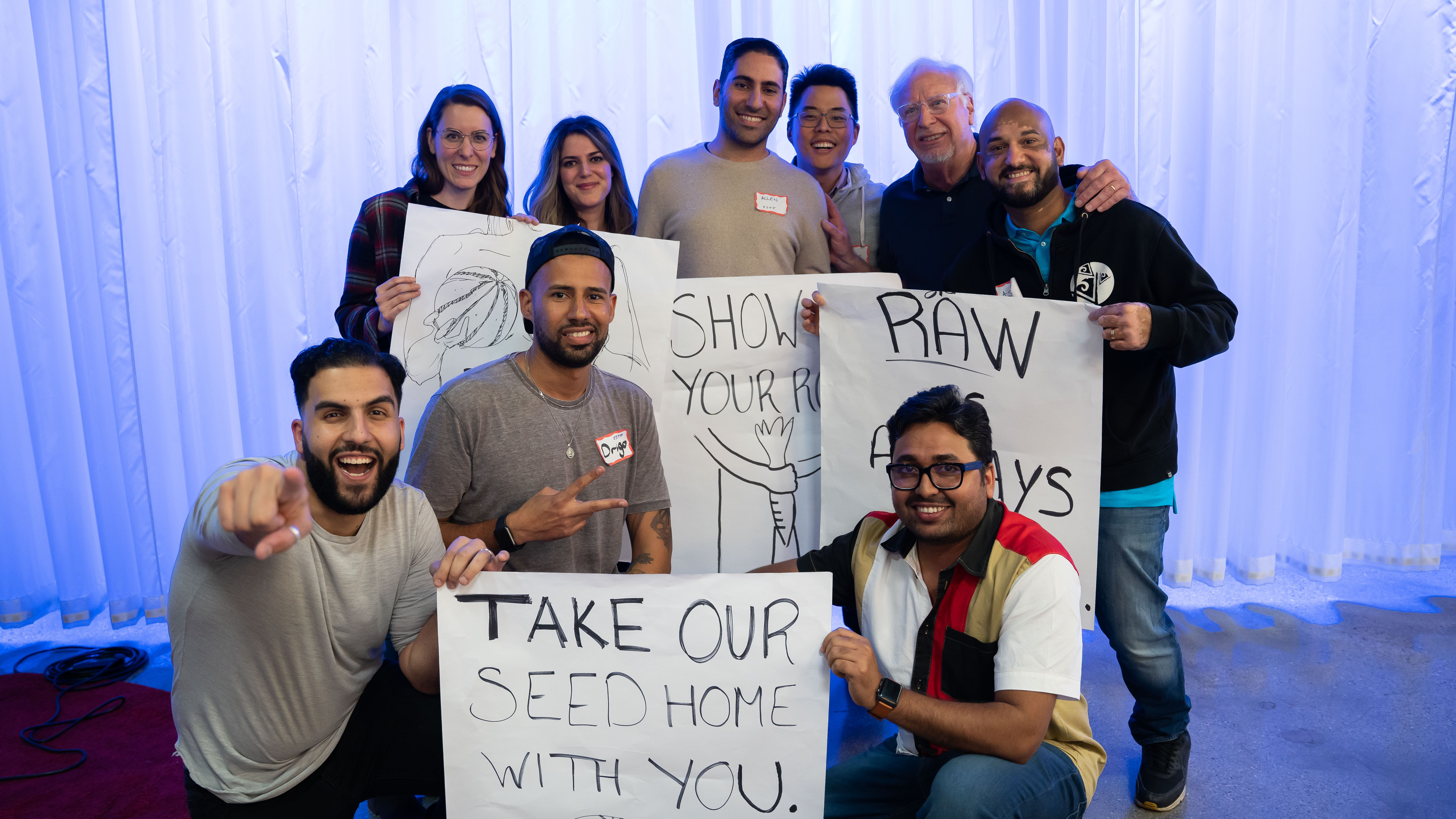 Marty Neumeier poses with the winning team from the branding workshop.