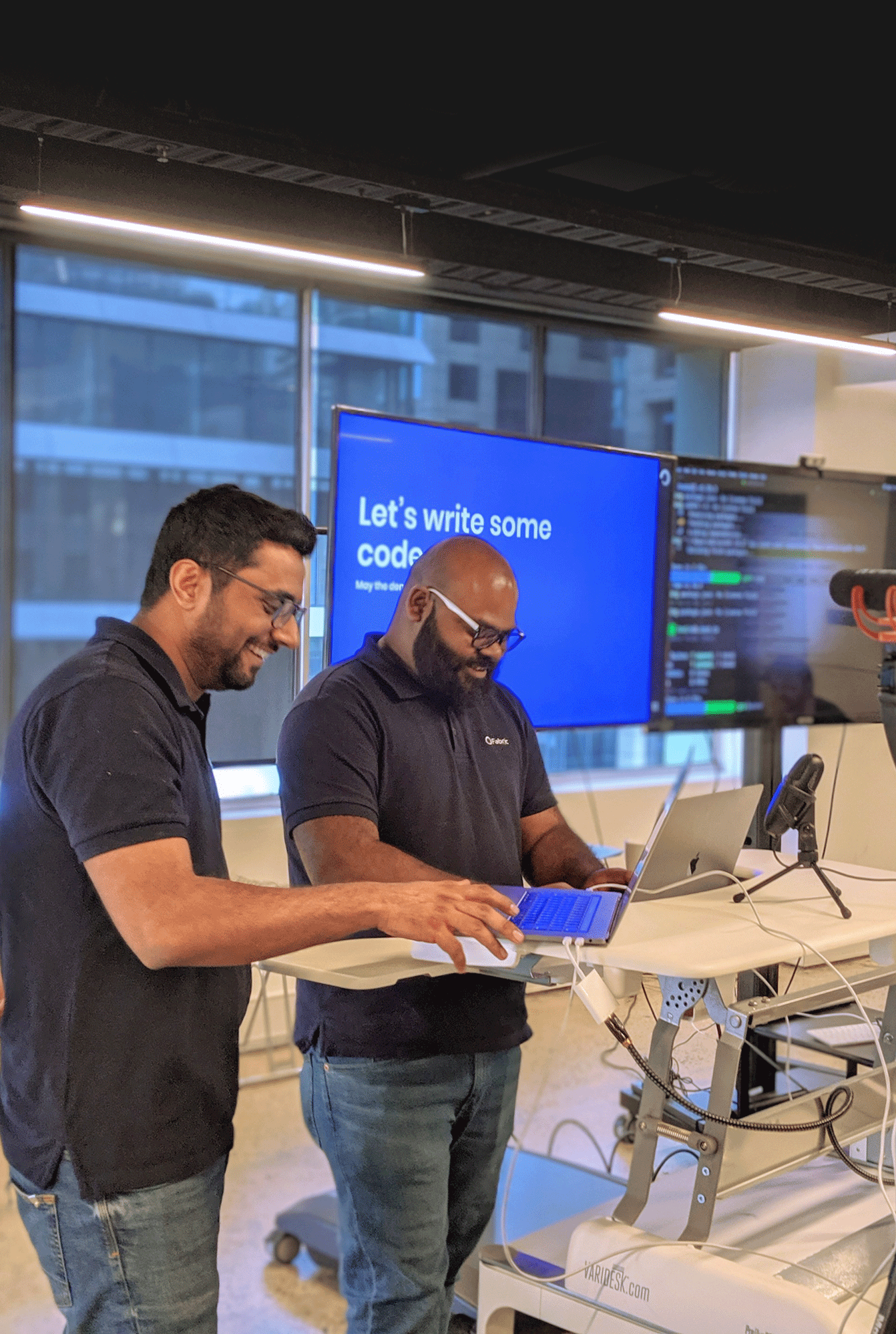 Business conversation, melbourne office, office plants, office sitting area, developers coding, code presentation, business analyst, product owner, technical discussion, work colleagues, strategy consulting, technology consulting, meetup, AWS, AWS CDK, Amazon Web Services