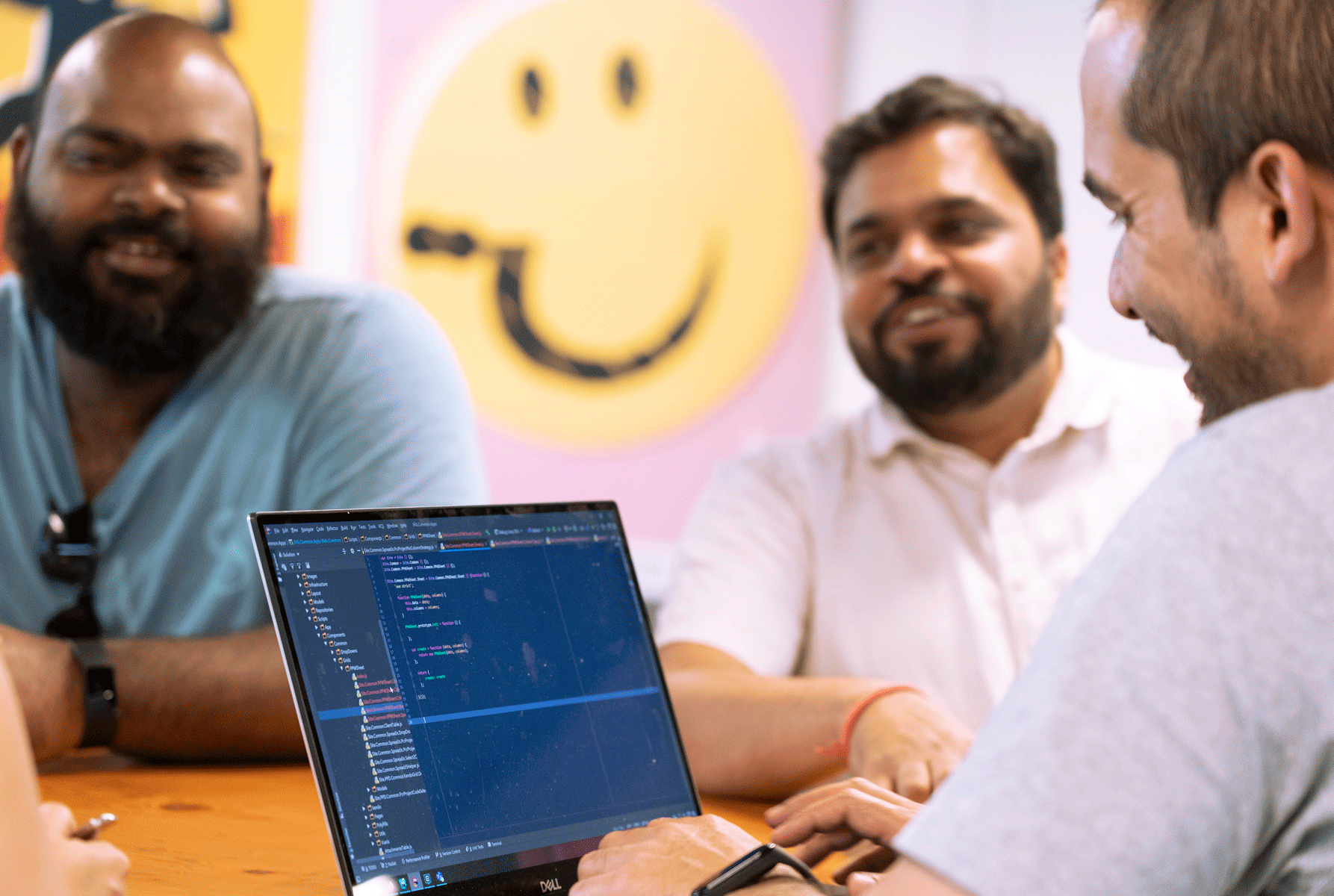 Strategy consulting, group of people, office plants, melbourne office, technical discussion, office sitting area, office with high rise view, office greenery, casual business meeting 