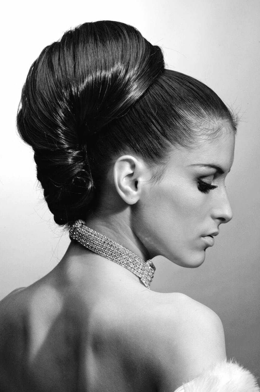 Black and white photo of woman with sleek hairstyle
