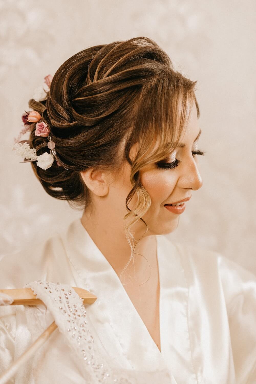 Woman wearing robe with delicate up do